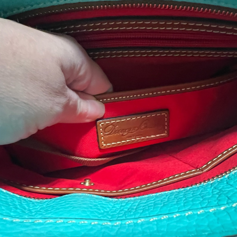 Dooney and Bourke purse never used . Brand new .